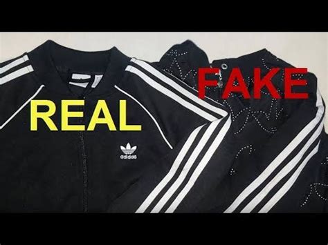 fake adidas windbreaker|adidas waterproof windbreaker.